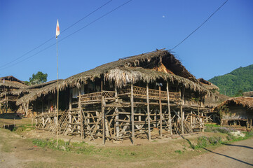 View of beautiful traditional Adi Galong or Galo tribal house on stilts in a mountain village of...