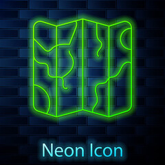 Glowing neon line Folded map icon isolated on brick wall background. Vector