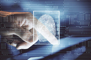 Double exposure of man's hands holding and using a digital device and fingerprint hologram drawing....