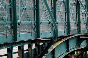 Old Steel Footbridge Over a River Detail