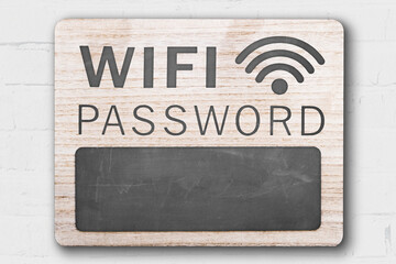 Chalkboard with wifi password sign with empty copy space.