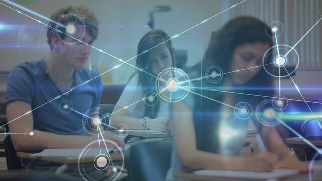 Glowing network of connections against group of students studying sitting on their desks in class