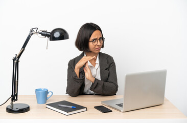 Young business mixed race woman working at office making time out gesture