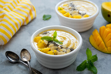 Mango smoothie bowl with chia seeds. Clean eating concept