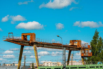 Old industrial crane in the abandoned industrial area