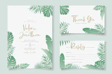 Wedding invitation template with tropical leaf ornament