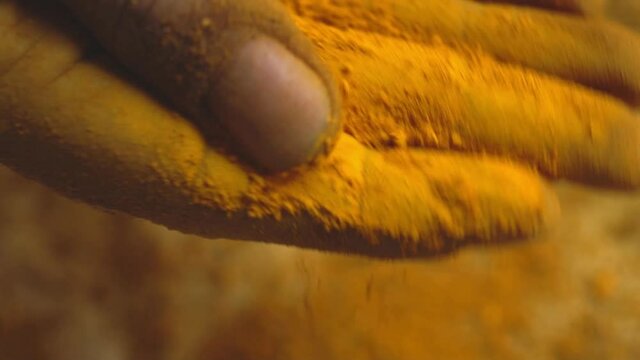 Macro Shot Of Hands During The Production Of Madder Powder, Cultural Process In Pakistan