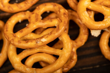 Bread figures with salt on a wooden table. Close-up Selective focus.