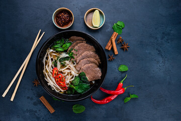 Pho bo, Vietnamese food, rice noodle soup with sliced beef - obrazy, fototapety, plakaty