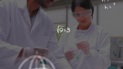 Mathematical equations and symbols against male and female health workers working at laboratory - Powered by Adobe