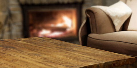 Obraz na płótnie Canvas Desk of free space and home interior with fireplace 