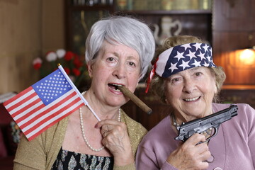 American ladies holding a gun and smoking a cigar