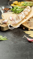 Traditional smoke dried pork, sausage on a board