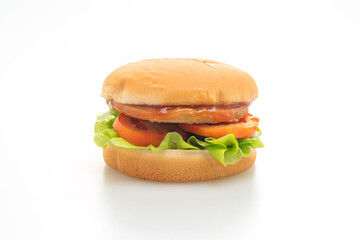 chicken burger with sauce on white background