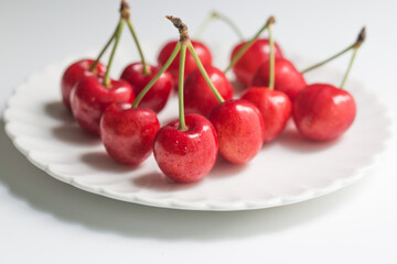 Fresh cherry fruit isolated on white background.