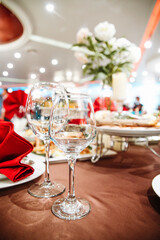 two glasses for drinks in the restaurant on the table at the party