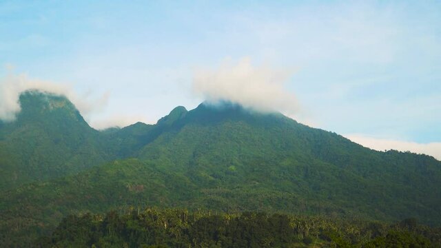 Mountains covered with tropical forests. Hibok-Hibok Volcano. Camiguin, Philippines. Travel concept.