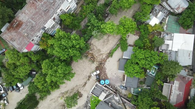 Stream of water from the mountains on the city streets