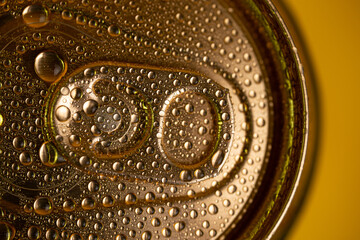 close-up of a key on a metal drink can