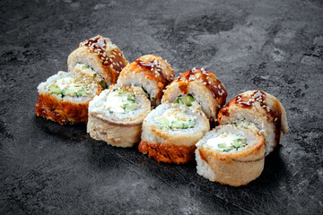 Philadelphia sushi roll set with ell fish and cream cheese. Japanese dish of unagi roll with rice