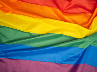 Full frame of the rainbow flag (LGBT). Top view. Flat lay. Space for text. Love concept