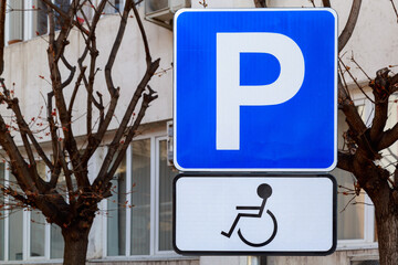 Disabled parking road sign. Background with copy space