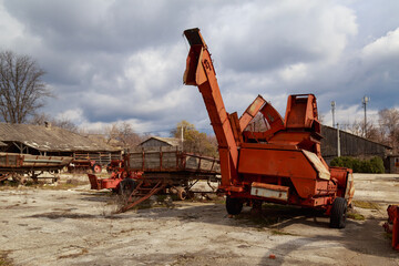 Devastation and decline in the agro-industrial sector. Cemetery of old rusty agricultural...