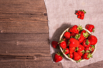 Fresh ripe strawberry in a wicker basket