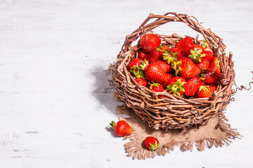 Fresh ripe strawberry in a wicker basket