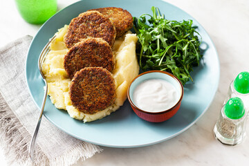 vegan lentil cutlets without meat with potatoes and salad. healthy eating