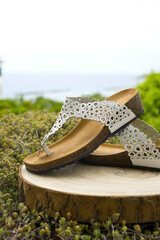 White sandals with heart decorations and summer style