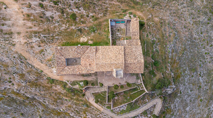 Aerial shot of Hermitage of el Santo Cristo in an ancient village of Bocairent, Valencia, Spain - obrazy, fototapety, plakaty