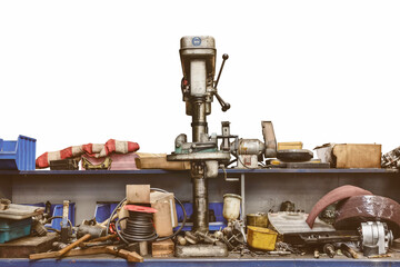 Old workshop bench with press drill and tools isolated on a white background