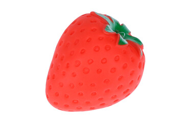Red toy strawberry, on a white background, isolated image