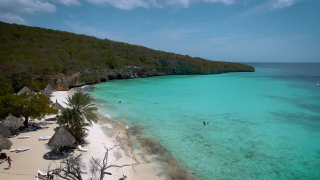  Cas Abou Beach on the Caribbean island of Curacao, Playa Cas Abou in Curacao Caribbean tropical white beach with the blue ocean. drone footage