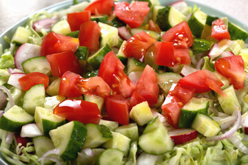 Close-up shot of exceptionally fresh and delicious vegetable salad in a plate