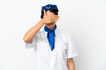 Airplane stewardess caucasian woman isolated on white background covering eyes by hands. Do not want to see something