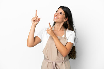 Restaurant waiter over isolated white background pointing with the index finger a great idea