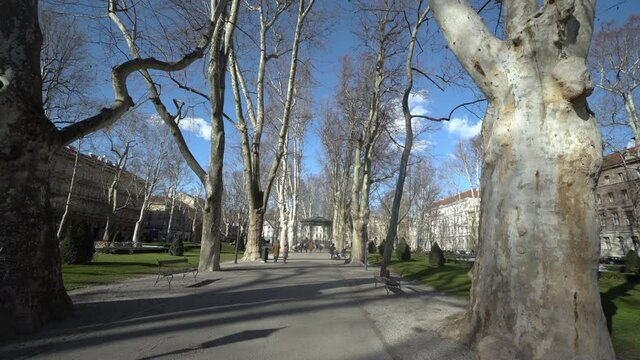 Promenade with a view of old vintage pavilion in the Zrinjevac park in Zagreb in autumn