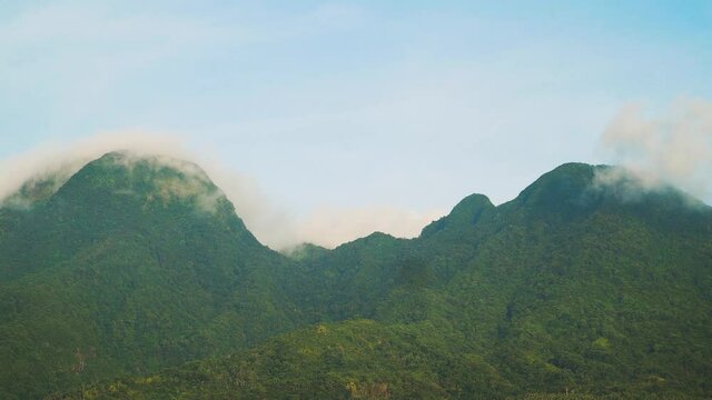 Mountains covered with tropical forests. Hibok-Hibok Volcano. Camiguin, Philippines. Travel concept.