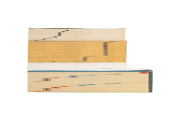 Closeup group of stacked thick books isolated on white background.