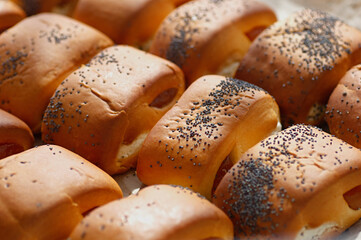 Bakery. Set of buns with jam and poppy seeds close up. Baking from flour. Selective focus.