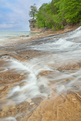 Spring landscape of Chapel Beach, Waterfall, and Rock, Lake Superior, Pictured Rocks National Lakeshore, Michigan's Upper Peninsula, USA