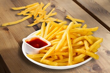 Sweet potato fries with ketchup sauce, homemade roasted in the oven