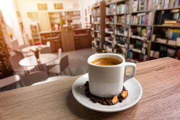 White cup of coffee with a saucer - obrazy, fototapety, plakaty