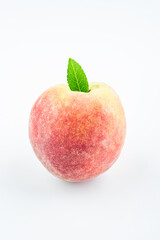 Fresh peaches on white background