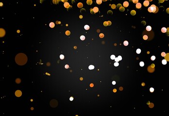 Glittering gold stars of bokeh use for celebrating on a dark background