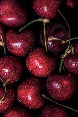 Organic cherry fruits with stems, above vantage point photography, macro photography