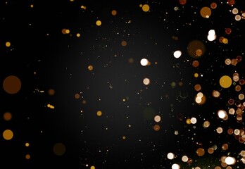 Glittering gold stars of bokeh use for celebrating on a dark background