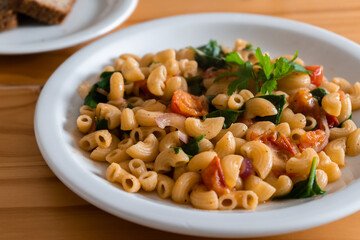 Close-up of macaroni pasta with vegetables
